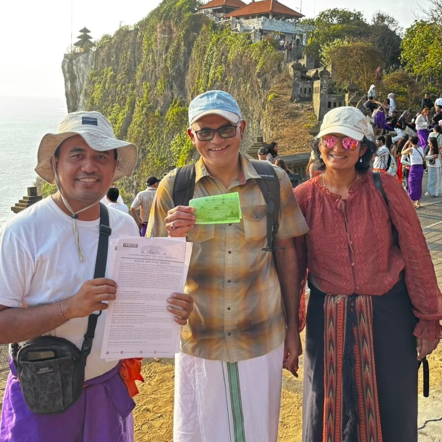 Guests exploring Uluwatu Temple with a local Bali private driver