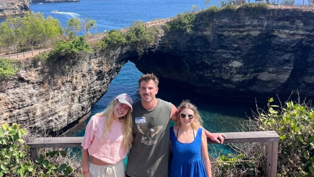 Guests at Broken Beach natural arch during a private Nusa Penida west trip