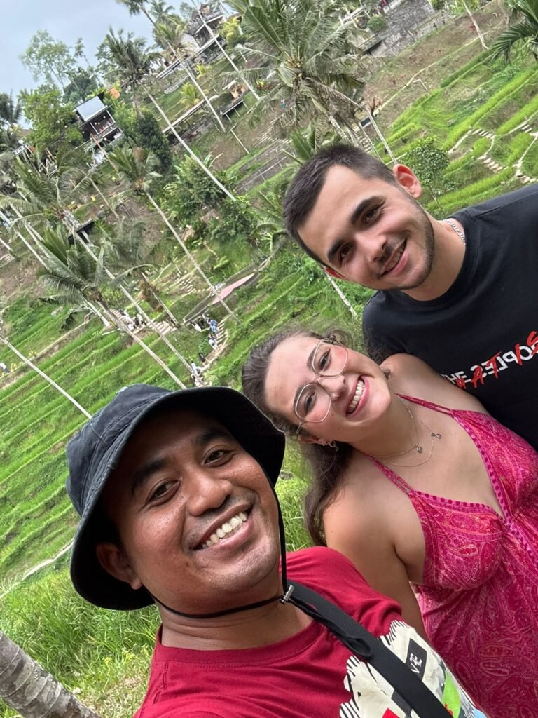 Oka from Book Trip Bali with guests at Tegalalang Rice Terrace in Ubud