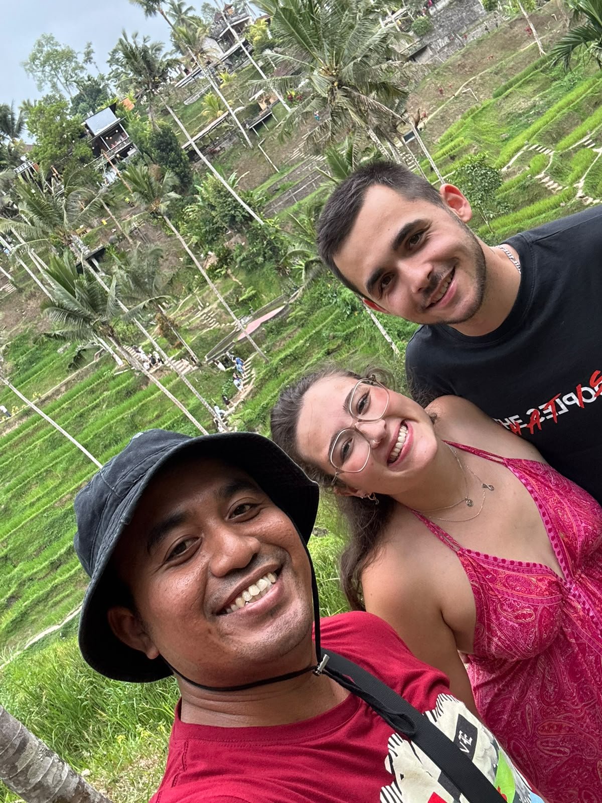 Oka from Book Trip Bali with guests at Tegalalang Rice Terrace in Ubud