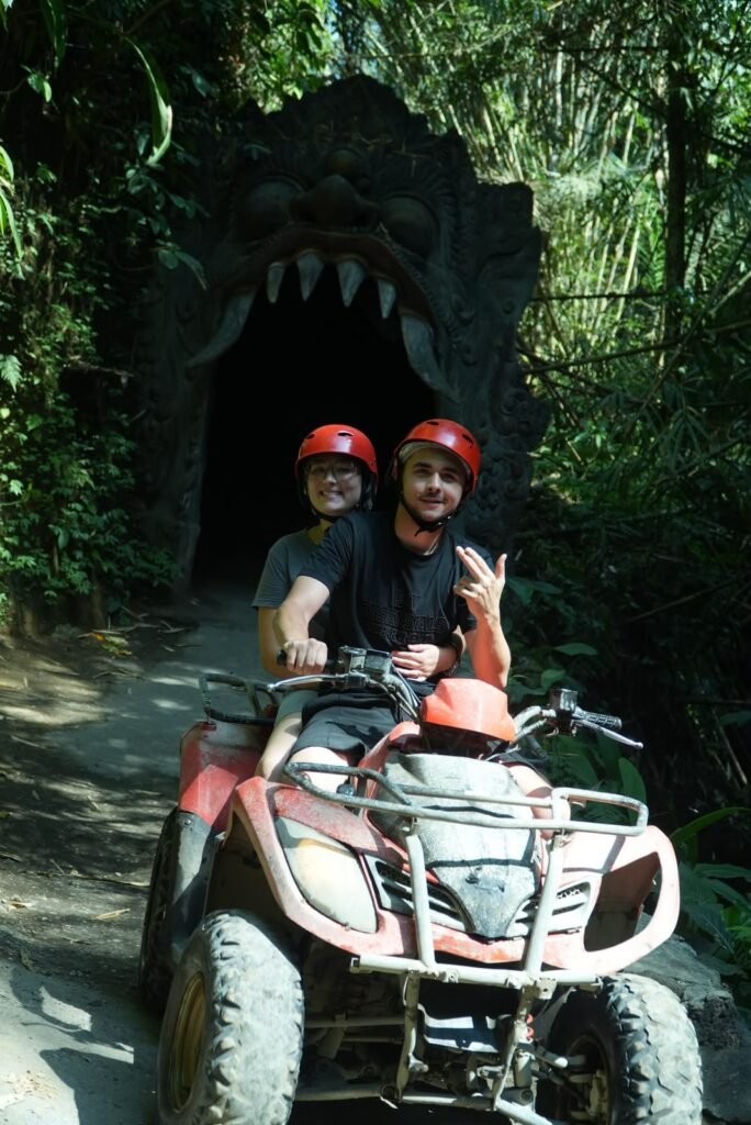 Guests riding an ATV through the Ubud countryside in Bali
