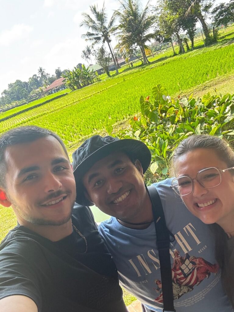 Oka, founder of Book Trip Bali, spending time with guests during their Ubud adventure