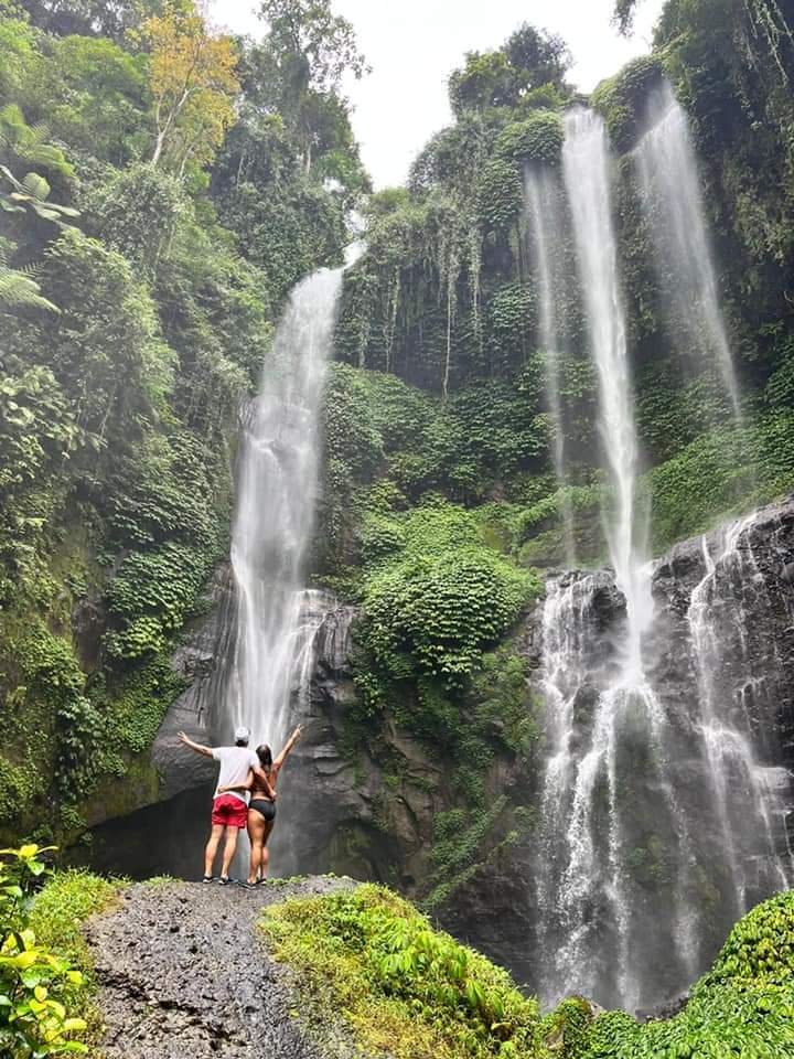 Sekumpul Waterfall in North Bali surrounded by tropical jungle